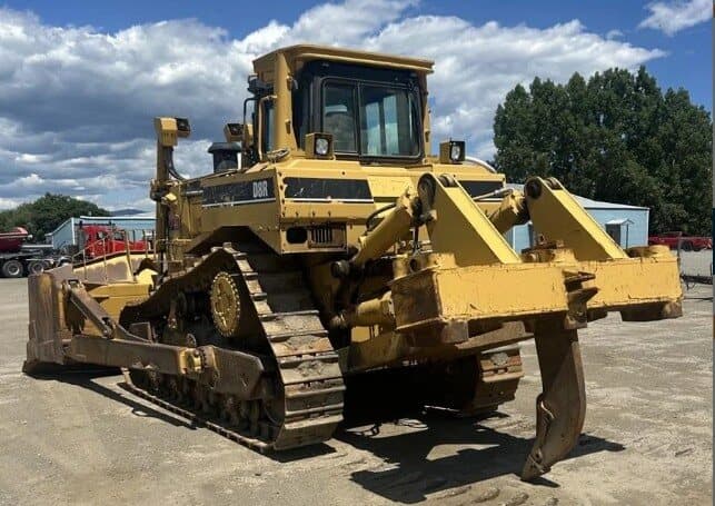 A used Caterpillar D8R track-type tractor with the ripper fitted
